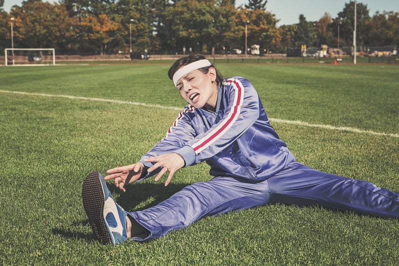 Woman stretching to improve flexibility